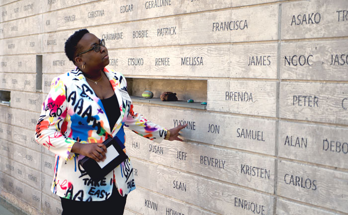 Brittany Clayborne looking at names in the National Donor Memorial