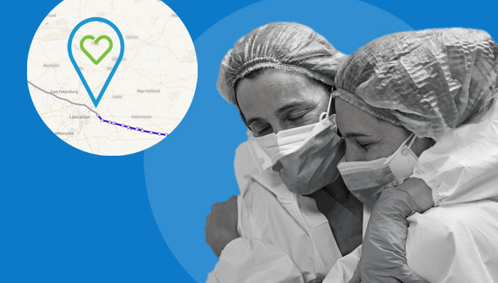 Two healthcare professionals in scrubs with small circle showing organ tracking map