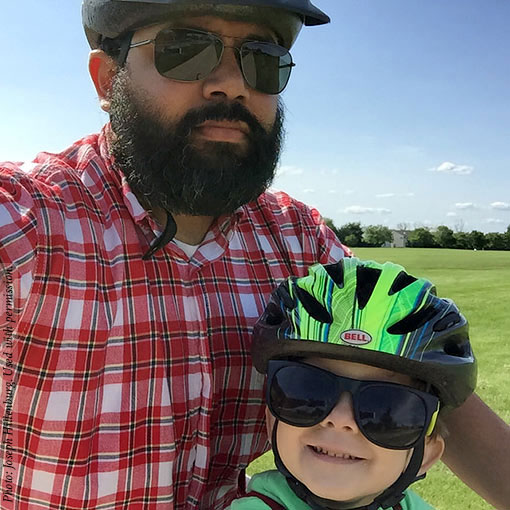 Pediatric transplant patient, Ben Hillenburg, with his father, Joseph Hillenburg. Photo: Joseph Hillenburg. Ben Hillenburg, and his father, Joseph Hillenburg, take a bike ride. Photo credits: (c)2015 Joseph Hillenburg. Used with permission.